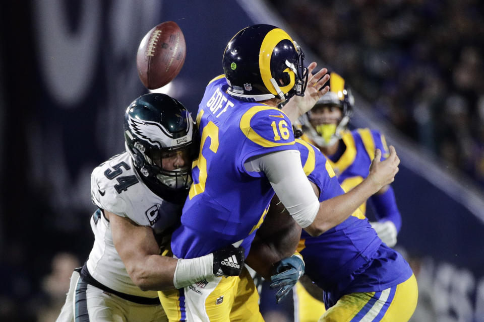 Philadelphia Eagles outside linebacker Kamu Grugier-Hill, left, forces a fumble by Los Angeles Rams quarterback Jared Goff during the second half in an NFL football game Sunday, Dec. 16, 2018, in Los Angeles. (AP Photo/Jae C. Hong)