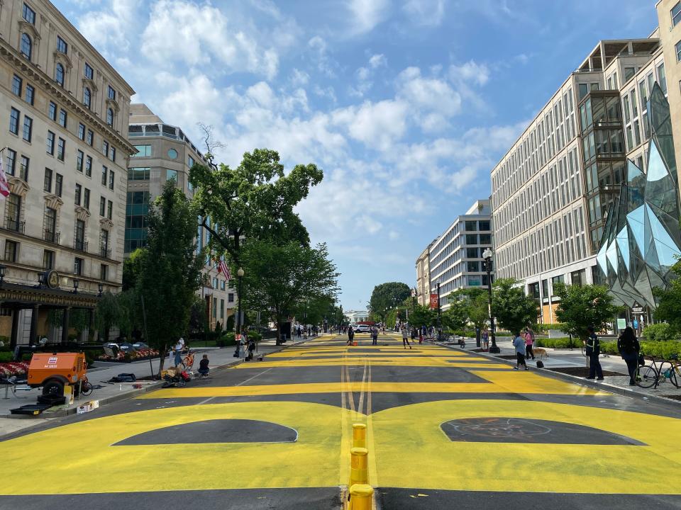 The district government ordered streets near the White House painted with a giant Black Lives Matter sign on Friday. The streets were previously occupied by federal forces. (Photo: DANIEL SLIM via Getty Images)