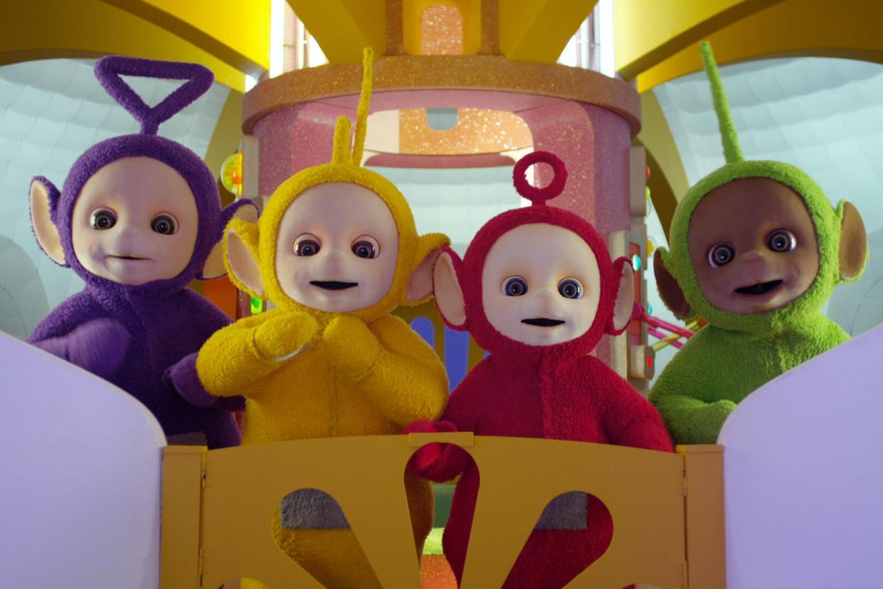 Teletubbies (L to R) Jeremiah Krage as Tinky Winky, Rebecca Hyland as Laa-Laa, Rachelle Beinart as Po, and Nick Kellington as Dipsy in Teletubbies. Cr. COURTESY OF NETFLIX © 2022