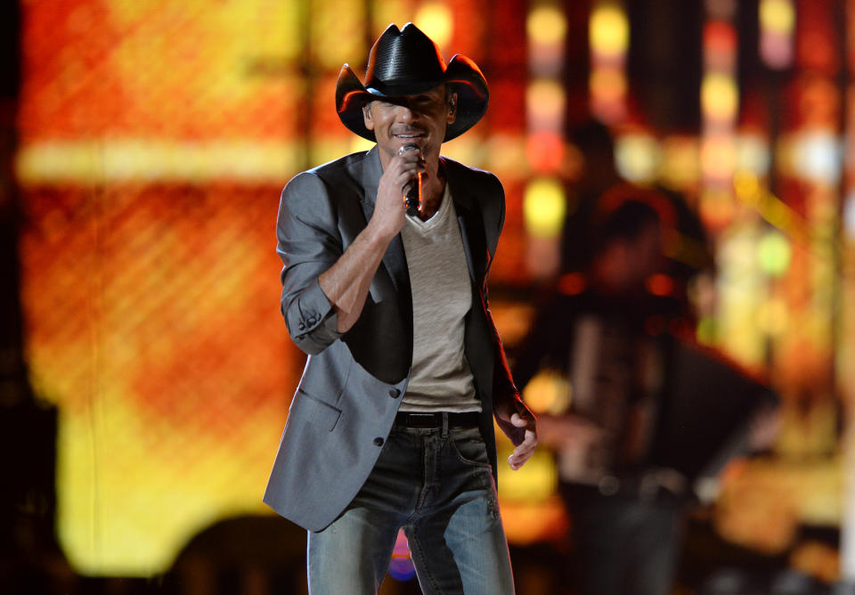 FILE - This April 8, 2013, file photo shows Tim McGraw performs at ACM Presents: Tim McGraw's Superstar Summer Night at the MGM Grand Garden Arena in Las Vegas. Curb Records has sued Tim McGraw and Big Machine Records in federal court, alleging copyright infringement and breach of contract. (Photo by Al Powers/Invision/AP, file)