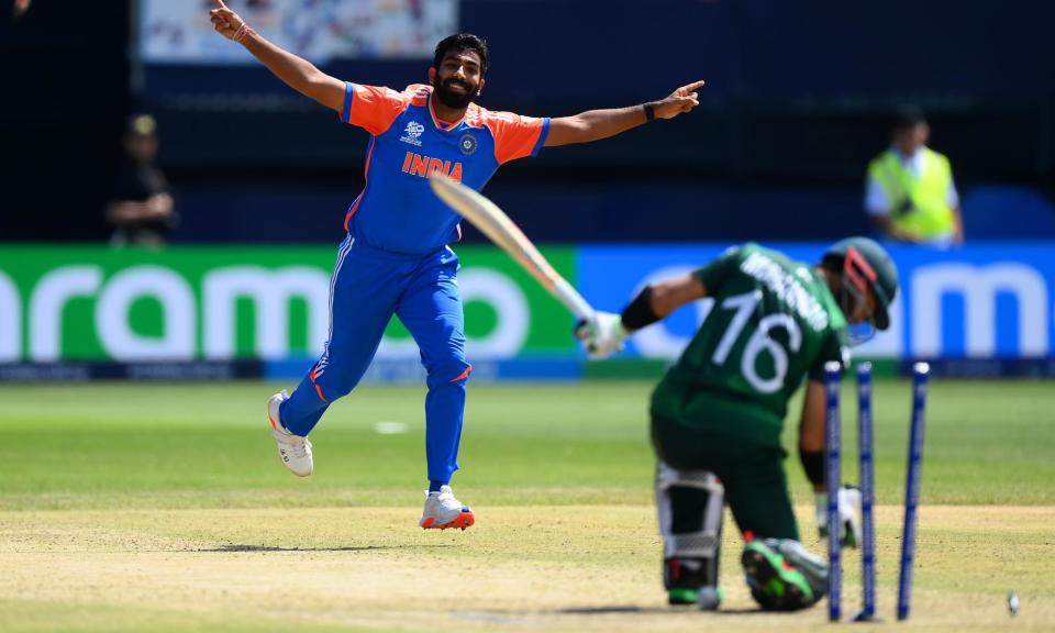<span>India’s Jasprit Bumrah celebrates taking the wicket of Mohammad Rizwan in front of a sell-out 34,000 crowd in New York.</span><span>Photograph: Alex Davidson/ICC/Getty Images</span>