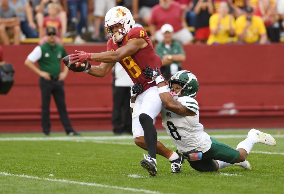 Iowa State Cyclones wide receiver Xavier Hutchinson (8) drives for a touchdown around Ohio Bobcats defensive back Justin Birchette (8) after making a catch during the third quarter at Jack Trice Stadium Saturday, Sept. 17, 2022, in Ames, Iowa.