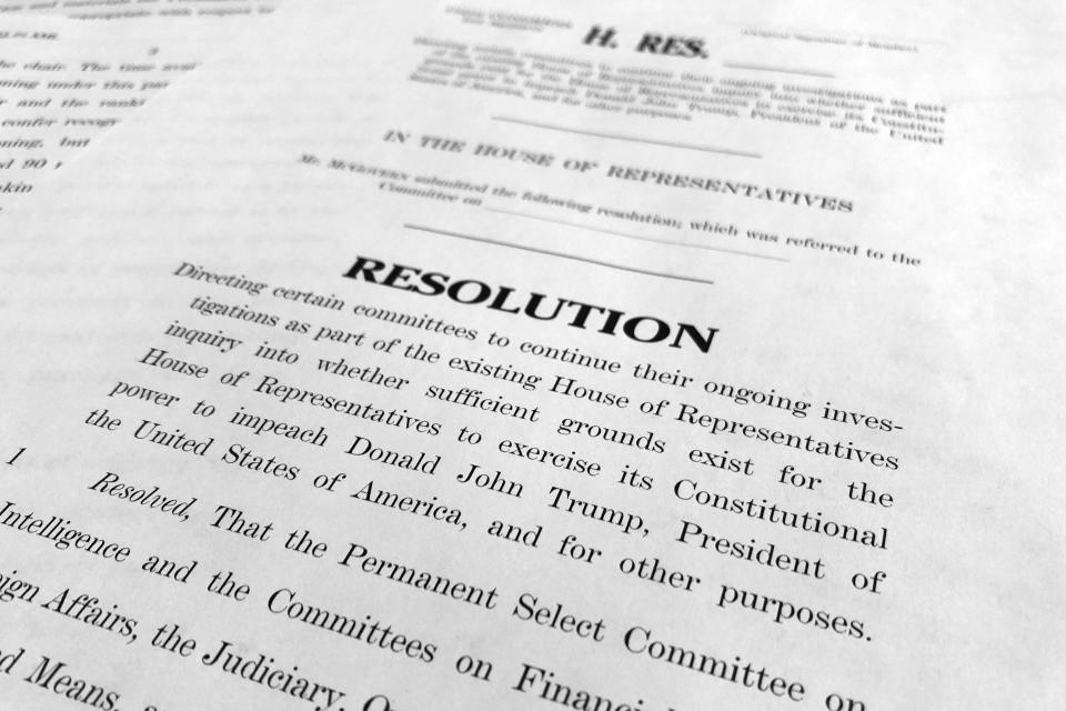 The text of a House resolution released by the Democrats that authorizes the next phase of the impeachment inquiry against President Donald Trump is photographed in Washington, Tuesday, Oct. 29, 2019. (AP Photo/Jon Elswick)