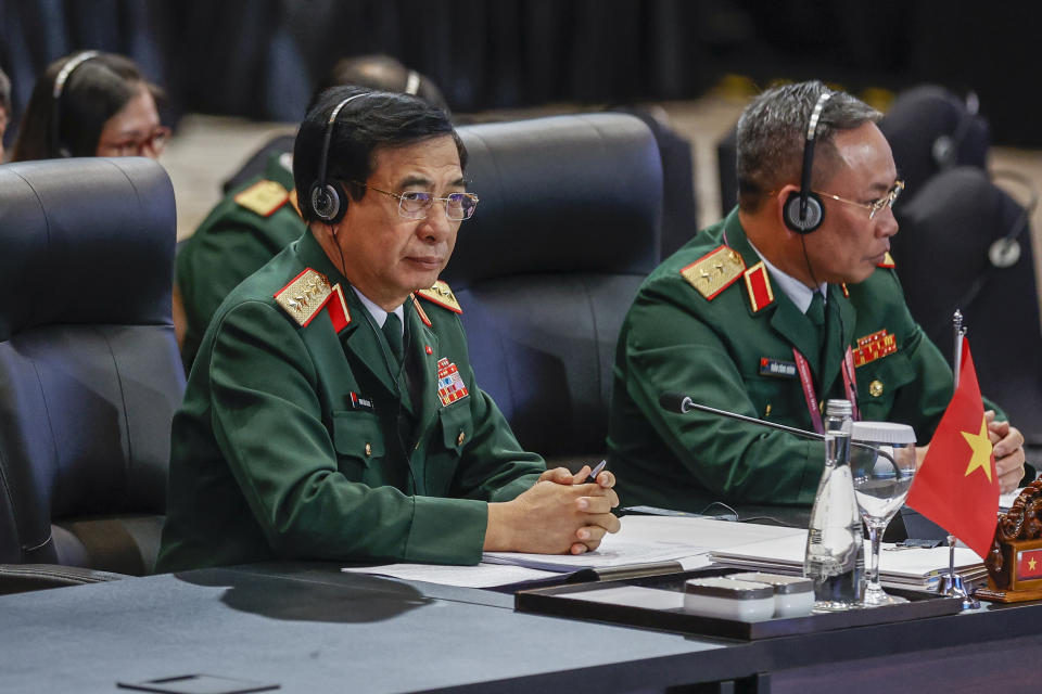 Vietnam's Defense Minister Phan Van Giang, left, attends the Association of Southeast Asian Nations (ASEAN) Defense Ministers Meeting in Jakarta, Indonesia, Wednesday, Nov. 15, 2023. (Mast Irham/Pool Photo via AP)