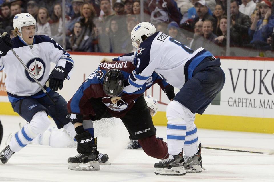 Jacob Trouba and Nikita Zadorov get into it after a huge hit on Winnipeg Jets forward Mark Scheifele (Getty Images).