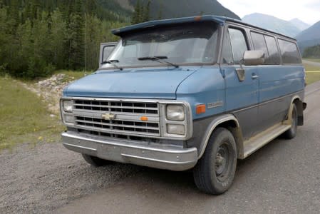 FILE PHOTO: A blue 1986 Chevrolet van at the scene of a double homicide in northern British Columbia