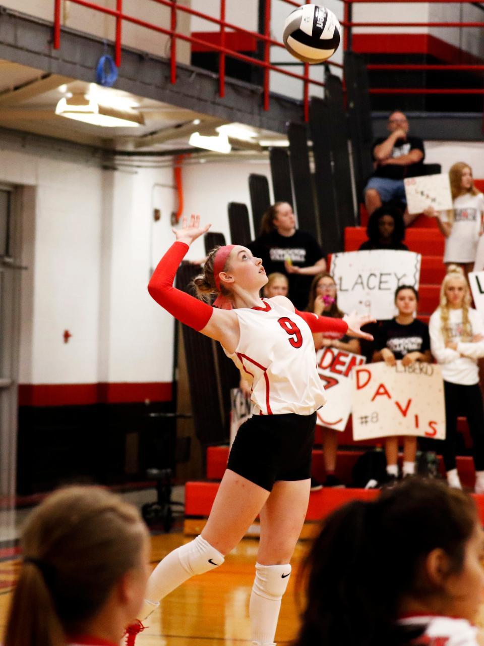 Lacey Guthrie serves the ball during Coshocton's 18-25, 23-25, 16-25 win against visiting New Lexington on Tuesday at The Wigwam.