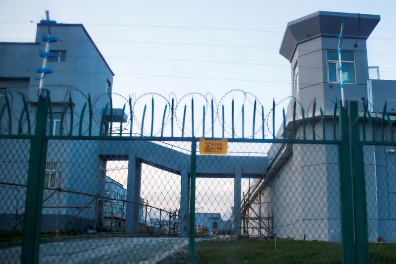 FILE PHOTO: A perimeter fence is constructed around what is officially known as a vocational skills education centre in Dabancheng