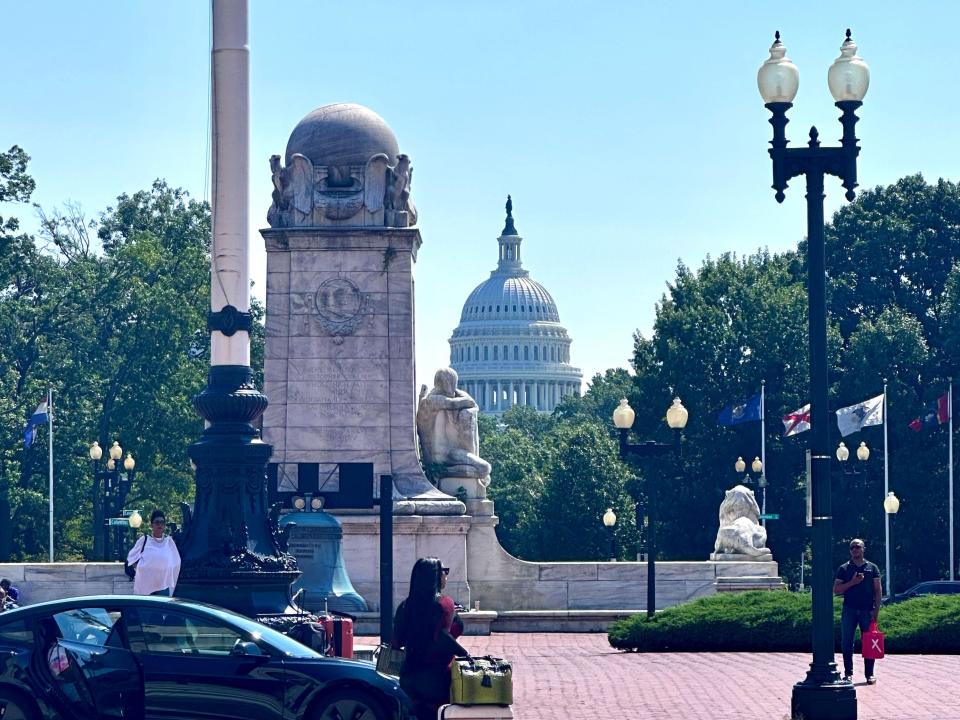 People outside the Capitol Building in Washington DC.