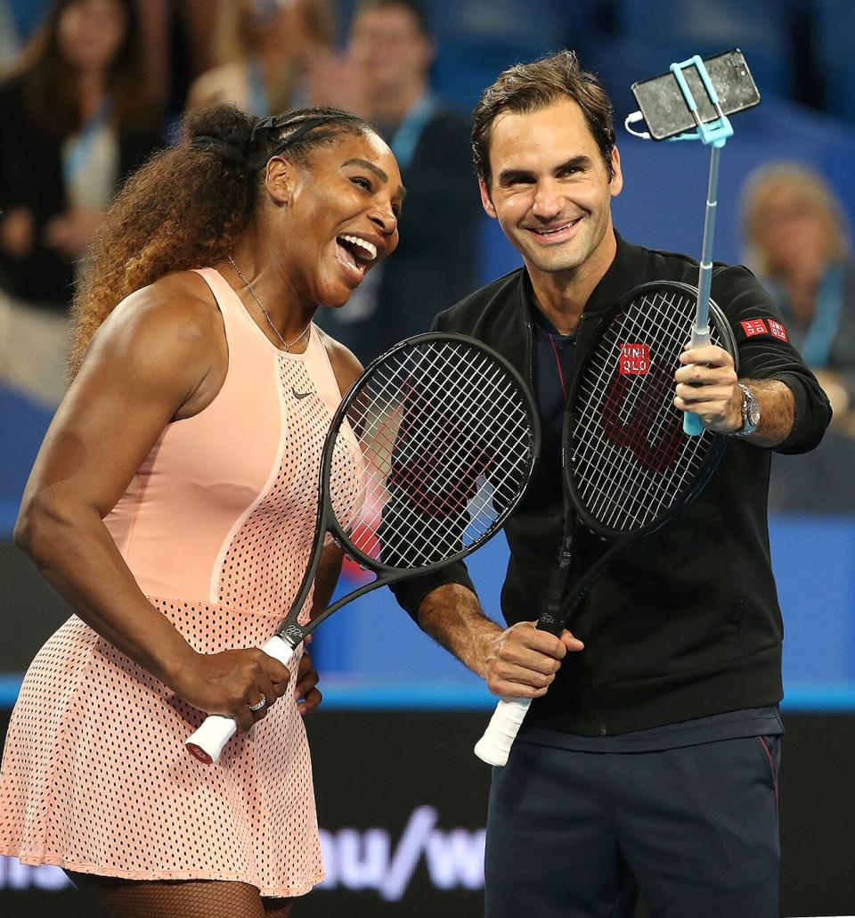 Serena Williams of the United States and Roger Federer of Switzerland take a selfie on court following their mixed doubles match during day four of the 2019 Hopman Cup at RAC Arena on January 01, 2019