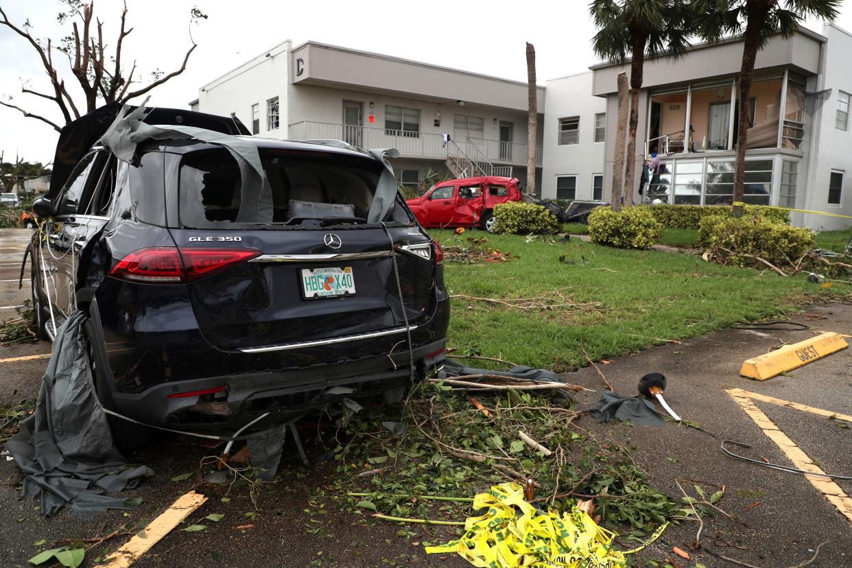 Cars damaged from an apparent overnight tornado spawned from Hurricane Ian at Kings Point 55+ community in Delray Beach, Fla.,  on Wednesday, Sept. 28, 2022. 