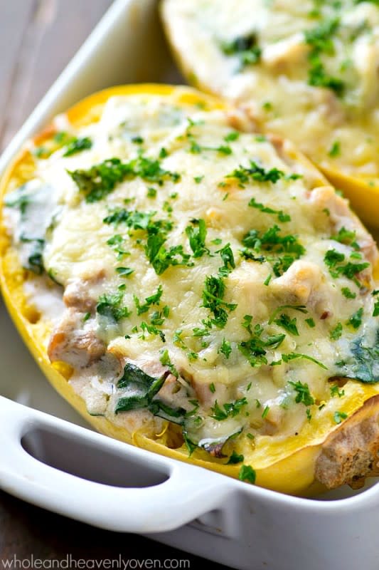<p>Whole and Heavenly Oven</p><p>Enjoy chicken alfredo lightened-up in these cheesy spinach-loaded spaghetti squash boats!</p><p><a href="http://wholeandheavenlyoven.com/2016/02/23/spinach-chicken-alfredo-spaghetti-squash-boats/" rel="nofollow noopener" target="_blank" data-ylk="slk:Get the recipe here!;elm:context_link;itc:0;sec:content-canvas" class="link "><em><strong>Get the recipe here!</strong></em></a></p>