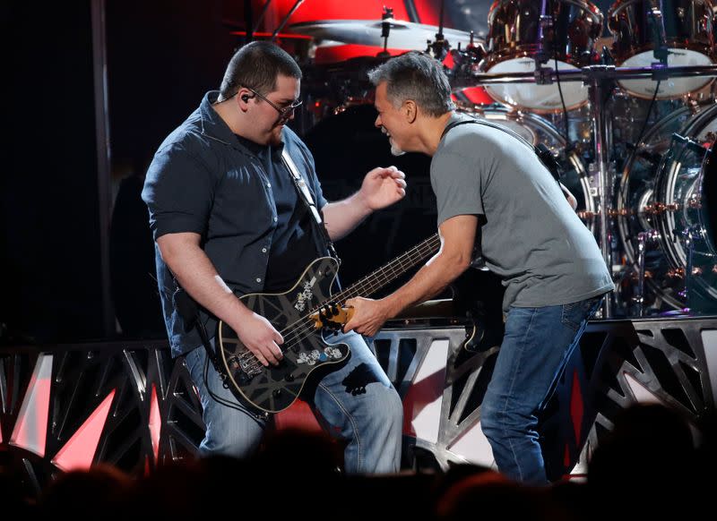 Wolfgang Van Halen performs "Panama" with his father Eddie at the 2015 Billboard Music Awards in Las Vegas