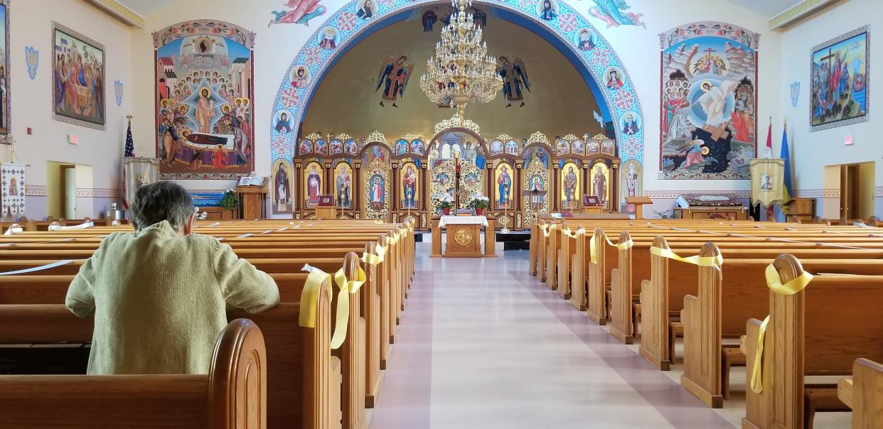 Vera Lackatas prays at the St. Mary's Ukrainiana Catholic Church on a Friday morning.