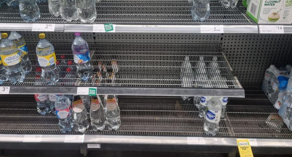 Bare shelves at Woolies thanks to a CO2 shortage. 