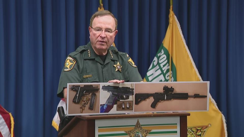 <div>Polk Co. Sheriff Grady Judd shows the weapons found in the suspect's car.</div>