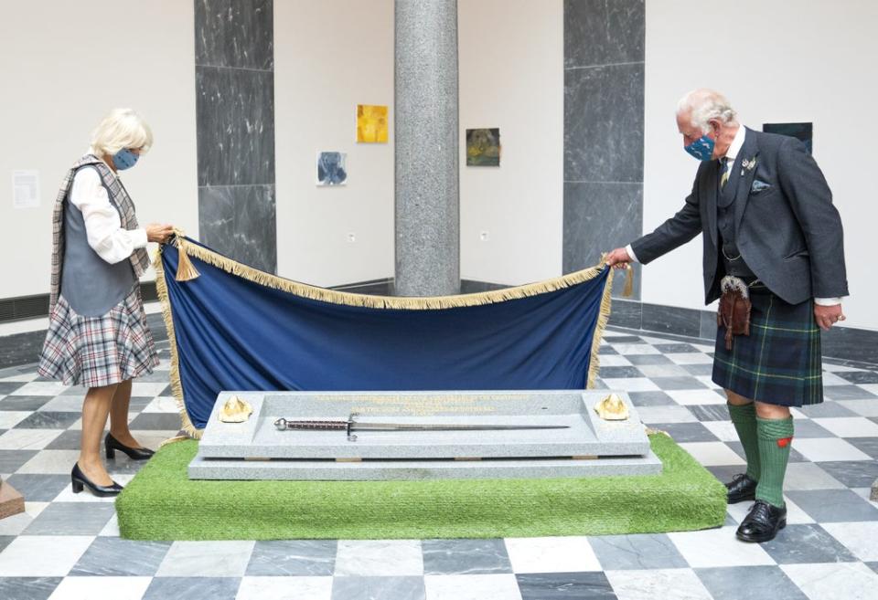 The royal couple unveiled a sword to commemorate the 700th anniversary of the granting of the freedom lands to Aberdeen (Jane Barlow/PA) (PA Wire)