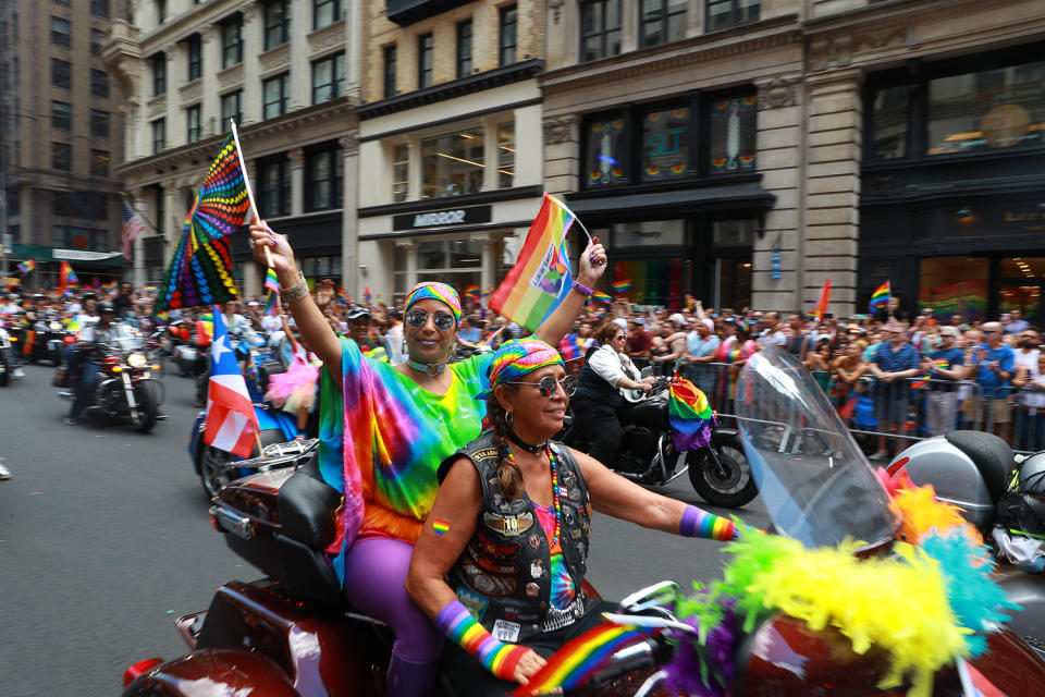 Women riding motorcycles waved rainbow colored flags during the N.Y.C. Pride Parade in New York on June 30, 2019. (Photo: Gordon Donovan/Yahoo News)