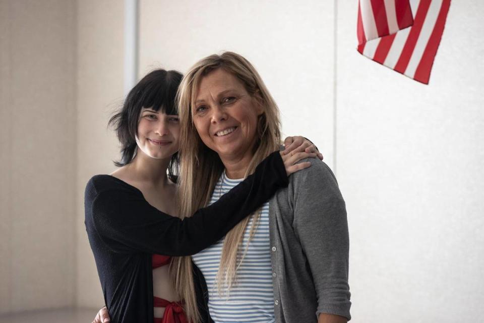 Jade Bruce, a graduating senior at Henry Clay High School, poses for a portrait with Jennifer Grigsby, a counseling specialist, at the school in Lexington, Ky., on Friday, May 26, 2023.