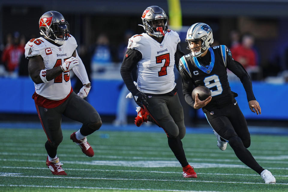 Carolina Panthers quarterback Bryce Young (9) runs out of the pocket against the Tampa Bay Buccaneers during the secind half of an NFL football game, Sunday, Jan. 7, 2024, in Charlotte, N.C. The Tampa Bay Buccaneers (AP Photo/Rusty Jones)