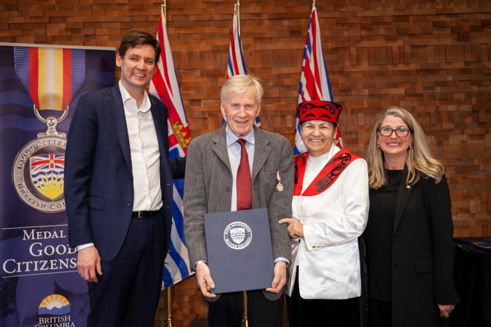 Premier David Eby and MLA Joan Phillip presents Brian DeBeck with a Medal of Good Citizenship from the government of British Columbia in Vancouver, British Columbia on Thursday, January 25, 2024. 