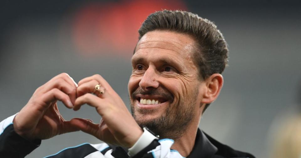 NEWCASTLE UPON TYNE, ENGLAND - MAY 22: Newcastle coach Jason Tindall smiles and makes a heart shape with his hands after the Premier League match between Newcastle United and Leicester City at St.  James Park on May 22, 2023 in Newcastle upon Tyne, England.  (Photo by Stu Forster/Getty Images)