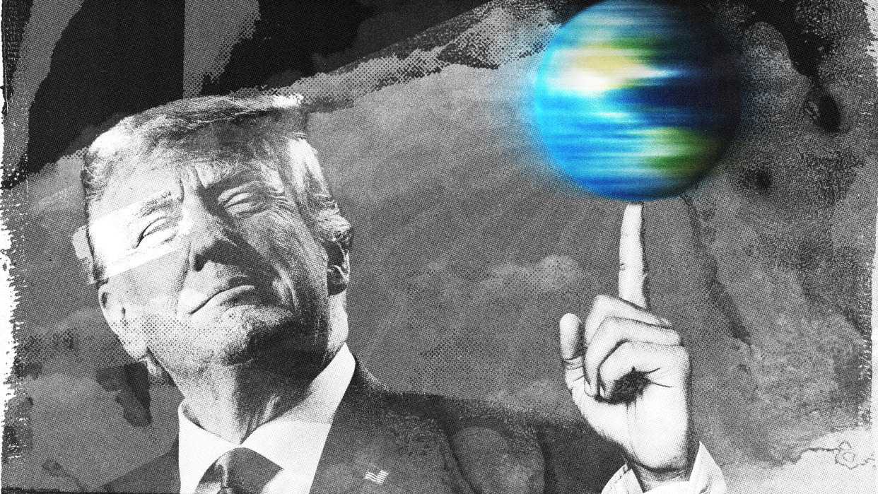  Donald Trump spinning a globe on his finger. 