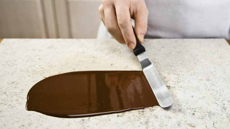 tempering chocolate on a counter