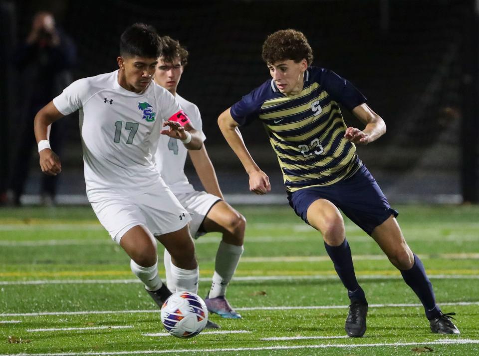 St. Georges' Eduardo Gonzalez-Garduno (left) defends as Salesianum's Jake Ross works in the Sals' 3-0 win in the opening round of the DIAA Division I state high school tournament Thursday, Nov. 10, 2022 at Abessinio Stadium.