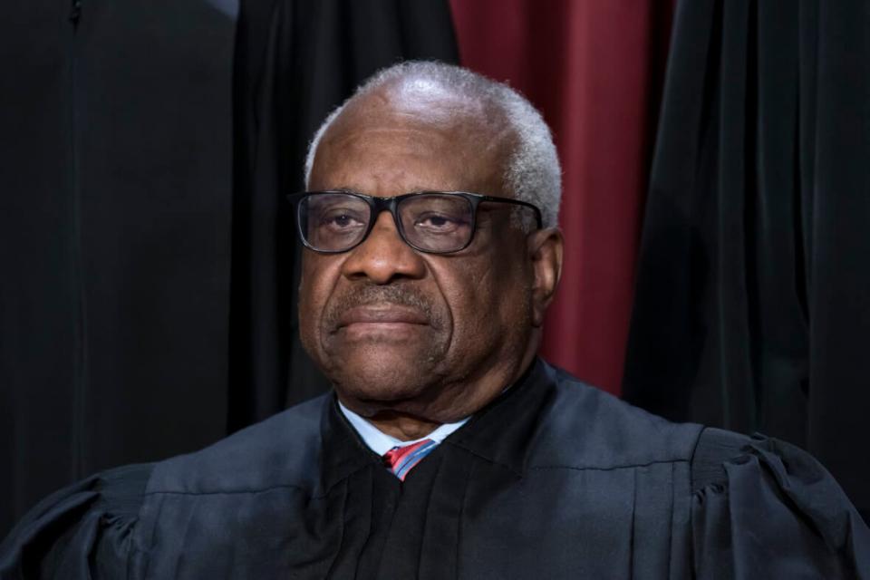 Associate Justice Clarence Thomas joins other members of the Supreme Court as they pose for a new group portrait, at the Supreme Court building in Washington, Oct. 7, 2022. (AP Photo/J. Scott Applewhite, File)