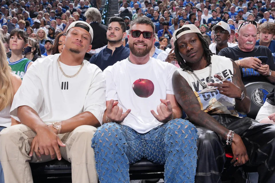 Patrick Mahomes, Travis Kelce, and Marquise Brown sit court atthe Minnesota Timberwolves and the Dallas Mavericks Game 3 of the Western Conference Finals of the 2024 NBA Playoffs on May 26, 2024 at the American Airlines Center in Dallas. (Jesse D. Garrabrant / NBAE via Getty Images)