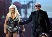 Christina Aguilera, left, and Pitbull perform at the 40th Anniversary American Music Awards on Sunday, Nov. 18, 2012, in Los Angeles. (Photo by John Shearer/Invision/AP)