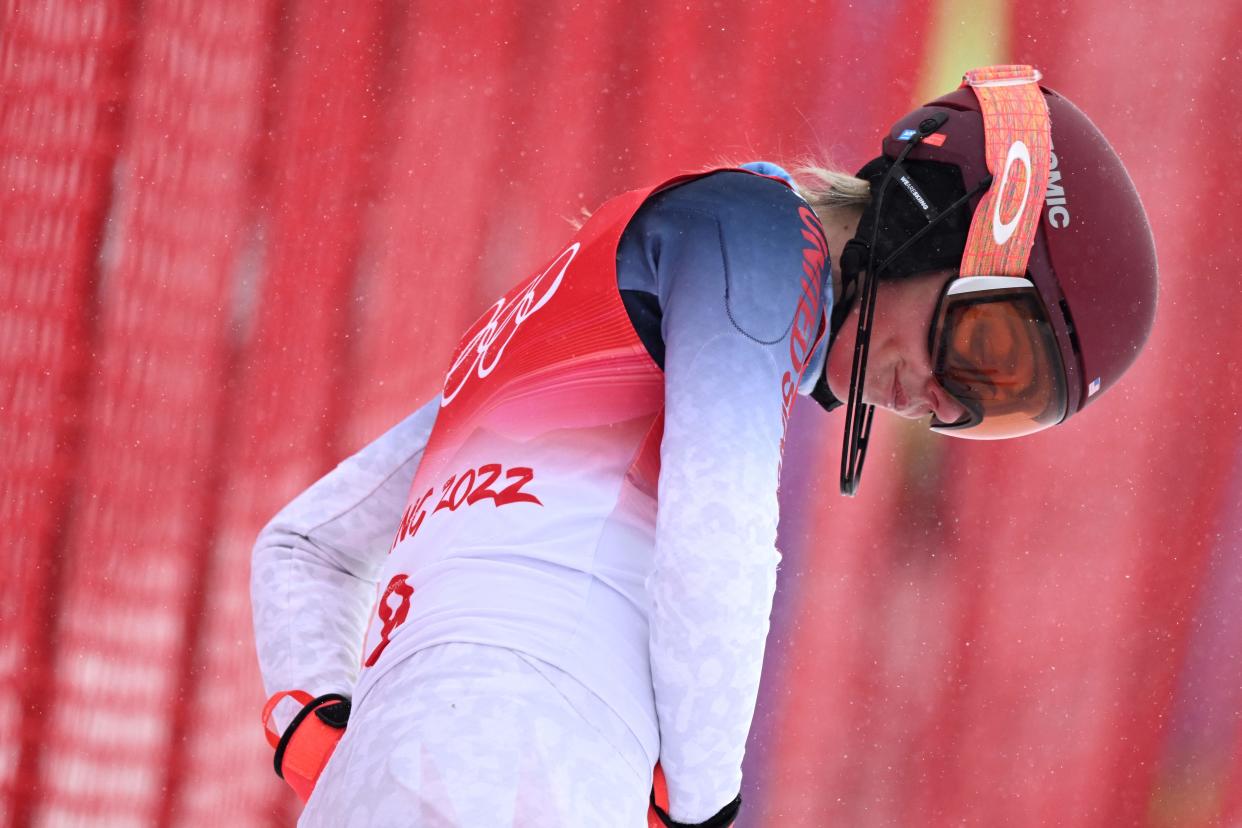 TOPSHOT - USA's Mikaela Shiffrin reacts as she did not finish the womens alpine combined slalom event during the Beijing 2022 Winter Olympic Games at the Yanqing National Alpine Skiing Centre in Yanqing on February 17, 2022. (Photo by Fabrice COFFRINI / AFP) (Photo by FABRICE COFFRINI/AFP via Getty Images)