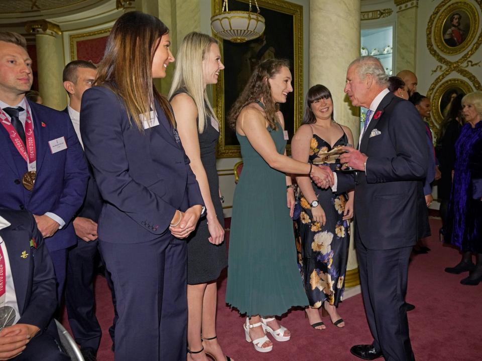 King Charles III meets Olympic medallists at Buckingham Palace on November 2, 2022.
