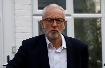 Britain's opposition Labour Party leader Jeremy Corbyn leaves his home in London