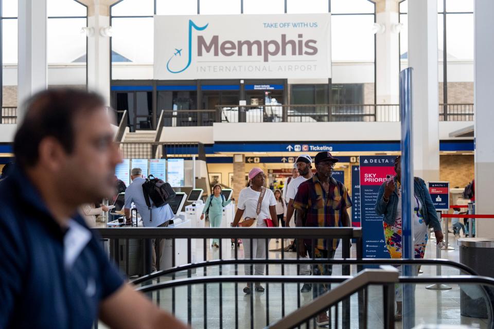 People walk through Concourse B at Memphis International Airport on Monday, Aug. 5, 2024.