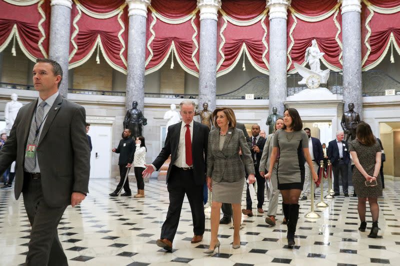 U.S. House Speaker Nancy Pelosi (D-CA) walks with House Ways and Means Committee Chairman Richard Neal (D-MA) on Capitol Hill in Washington