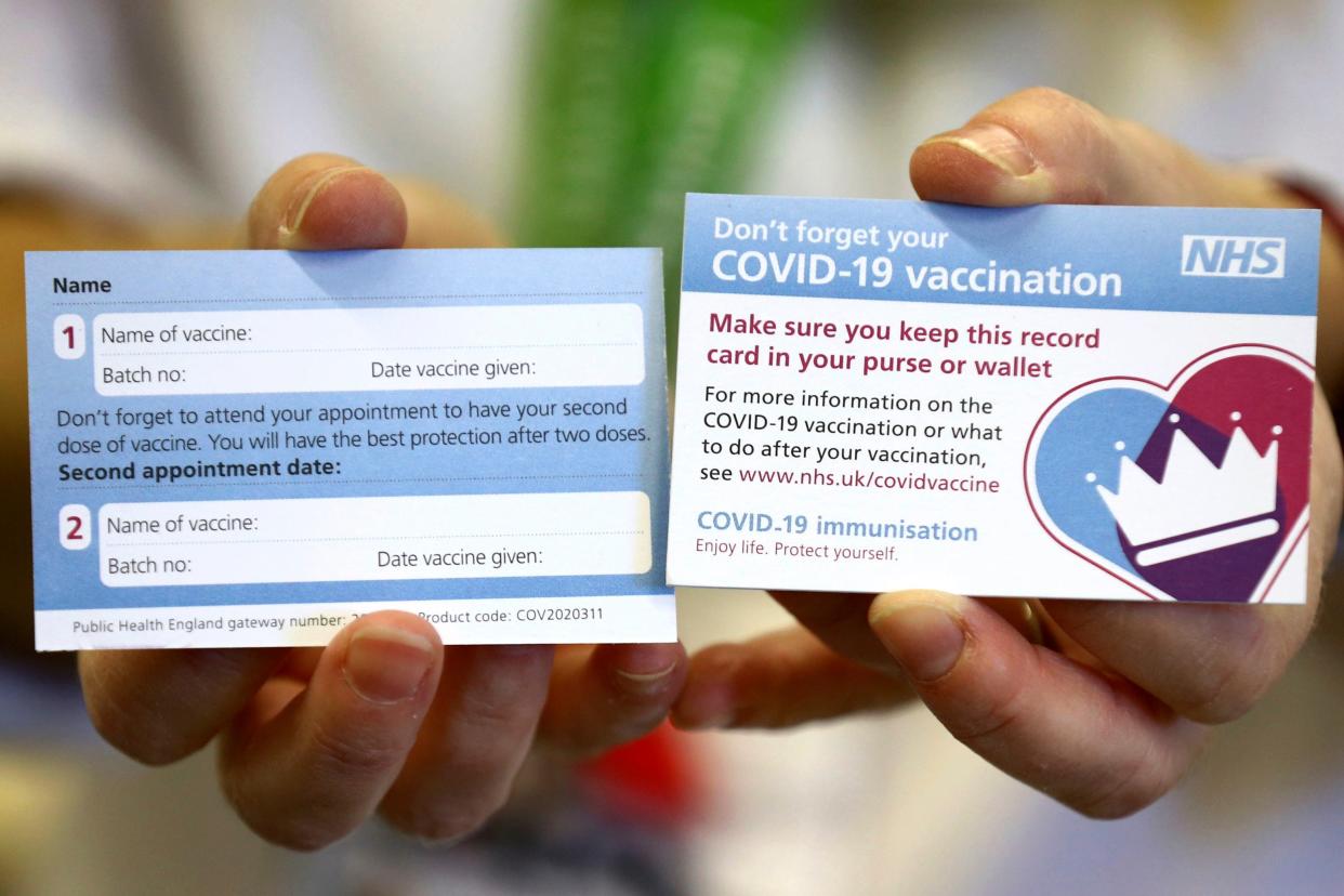 <p>Both sides of a record card that will be given to all recipients of the Pfizer coronavirus vaccine</p> (AP)