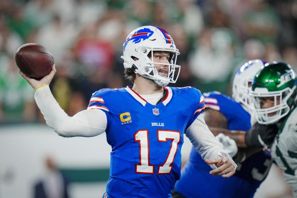 Buffalo Bills quarterback Josh Allen looks to pass.