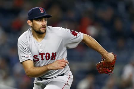 FILE PHOTO: Apr 17, 2019; Bronx, NY, USA; Boston Red Sox pitcher Nathan Eovaldi (17) reacts against the New York Yankees during the fourth inning at Yankee Stadium. Mandatory Credit: Adam Hunger-USA TODAY Sports