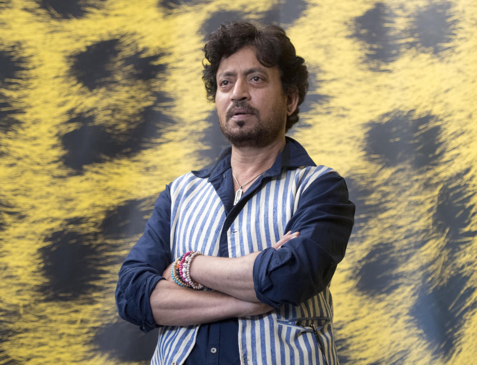 FILE - This Aug. 9, 2017 file photo shows Indian actor Irrfan Khan posing during the photocall for the film "The Song of Scorpions" at the 70th Locarno International Film Festival in Locarno, Switzerland. Khan, a veteran character actor in Bollywood movies and one of India's best-known exports to Hollywood, died Wednesday, April 29, 2020, after being admitted to Mumbai’s Kokilaben Dhirubhai Ambani hospital with a colon infection. He was 54. (Urs Flueeler/Keystone via AP, File)