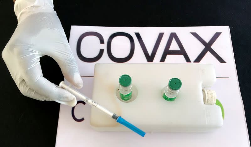 FILE PHOTO: Nurse prepares to administer the AstraZeneca/Oxford vaccine against the COVID-19 at the Eka Kotebe General Hospital in Addis Ababa