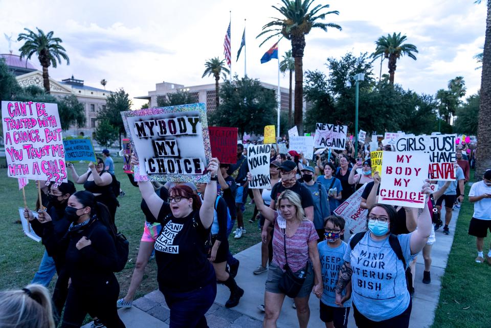 Abortion-rights activists protest outside the Arizona state Capitol following the Supreme Court's decision to overturn Roe v. Wade, in Phoenix on June 25, 2022.