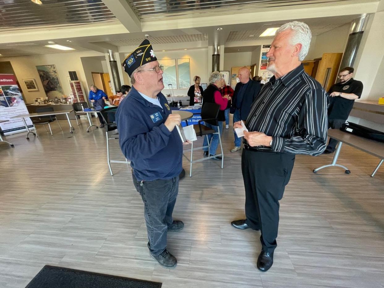 American Legion Post 317's Eugene Ipox, left, visits with Madison County Veteran Services Officer Dan Jackson April 6.