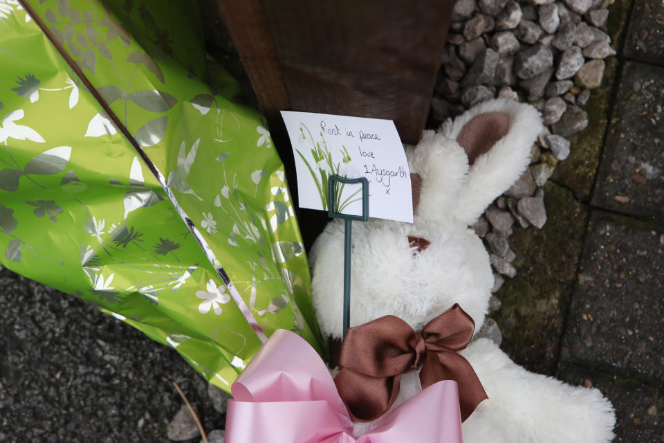 Tributes left at the scene of a fire at a house on Wensley Avenue, Hull, where two people have died, including an eight-year-old. PA Photo. Picture date: Saturday January 25, 2020. Emergency services were called to the house at around 7.50am on Saturday morning. A man was pronounced dead at the scene, while an eight-year-old girl died in hospital. See PA story FIRE Hull. Photo credit should read: Danny Lawson/PA Wire 