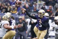 Oct 20, 2018; Seattle, WA, USA; Washington Huskies quarterback Jake Browning (3) passes under the pressure of Colorado Buffaloes defensive lineman Mustafa Johnson (34) during the first quarter at Husky Stadium. Mandatory Credit: Jennifer Buchanan-USA TODAY Sports