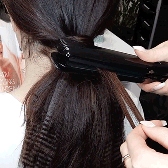Crimped hair is having a moment... yet again. (GIF: Rapunzel of Sweden)
