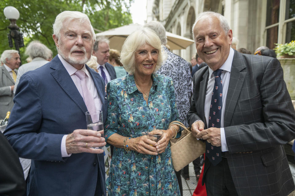 From left, Derek Jacobi, Camilla, Duchess of Cornwall and Gyles Brandreth during The Oldie Luncheon, in celebration of her 75th Birthday at National Liberal Club, London, Tuesday July 12, 2022. (David Rose, Pool Photo via AP)