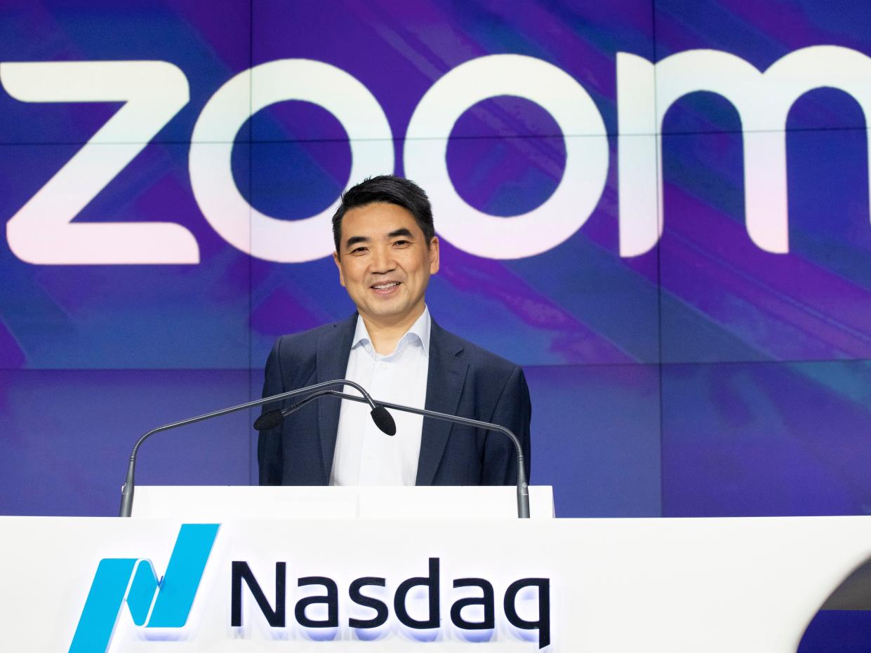 FILE - In this April 18, 2019 file photo, Zoom CEO Eric Yuan attends the opening bell at Nasdaq as his company holds its IPO in New York.  Millions of people are now working from home as part of the intensifying fight against the coronavirus outbreak. Beside relying on Zoom, the video conference service, more frequently as part of their jobs, more people are also tapping it to hold virtual happy hours with friends and family banned from gathering in public places.  (AP Photo/Mark Lennihan, File)