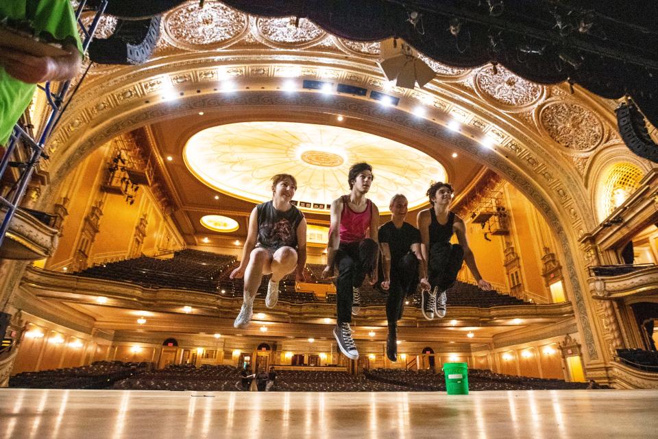 Julia Nurenberg, from left, Thomas McMahon, Cara Torchia and Brayden Lynam, pose for a photo a castmate took during a rehearsal for South Bend Civic Theatre’s production of “West Side Story” Monday, Oct. 3, 2022, at the Morris Performing Arts Center in South Bend.